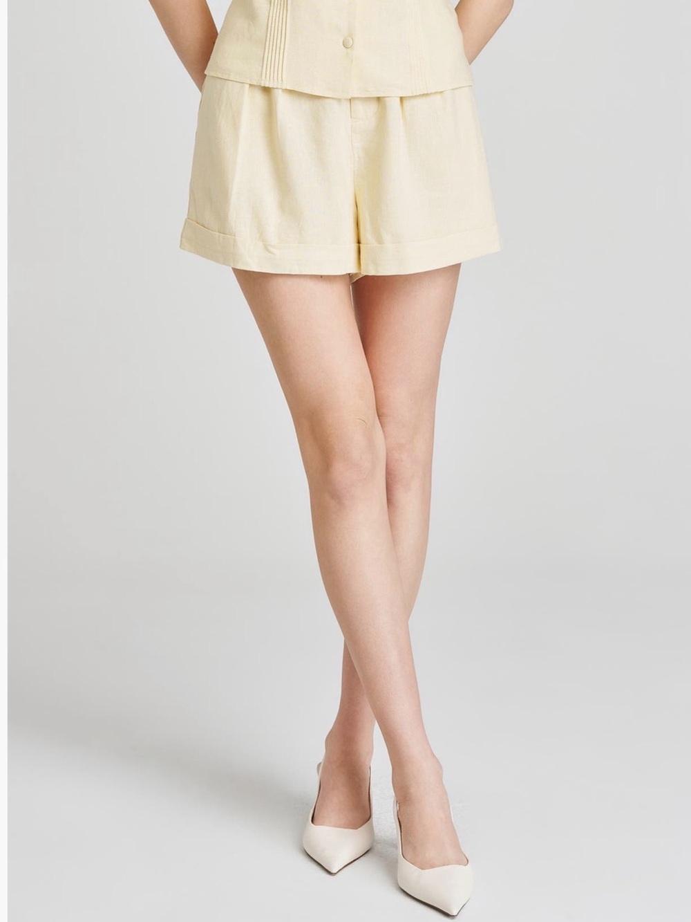 Wayf High Waist Linen Shorts in soft yellow